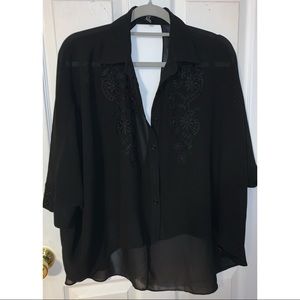 Sheer black blouse